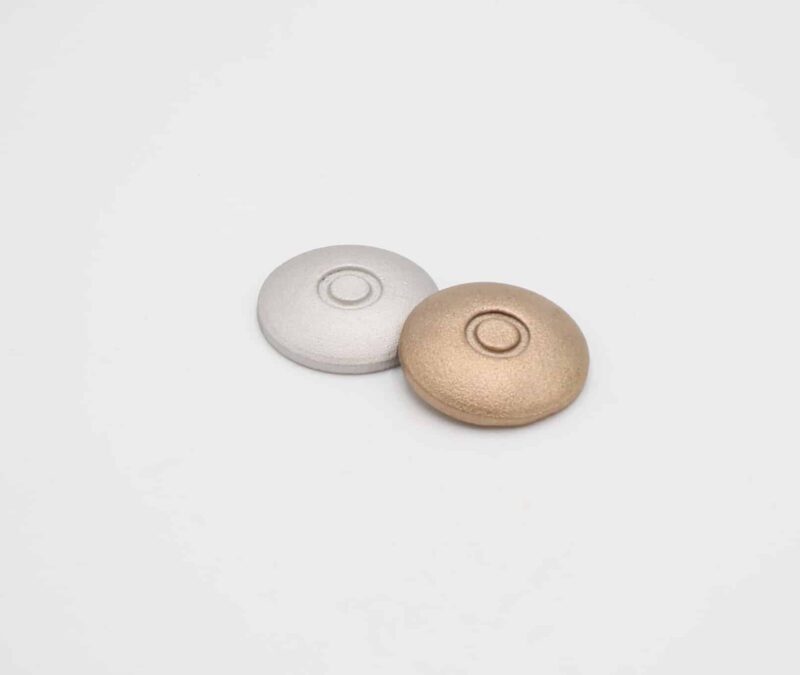 To farvede skiver i metalfinish